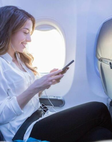 woman on phone in plane